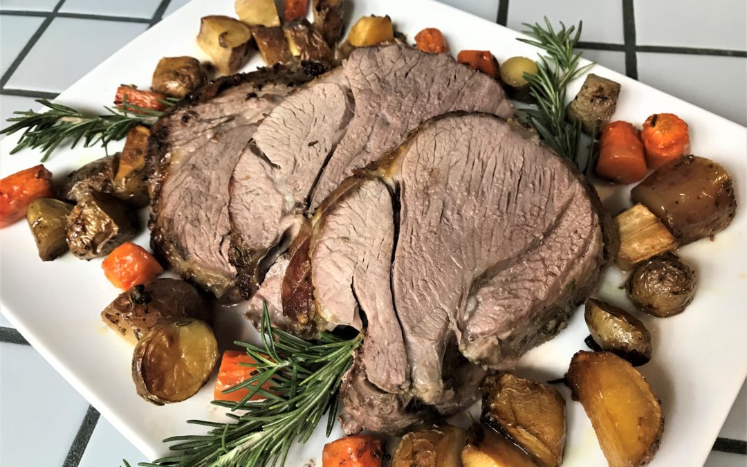 Roasted Leg of Lamb with Fingerling Potatoes, Carrots, and Parsnips and a Mint Sauce on the side