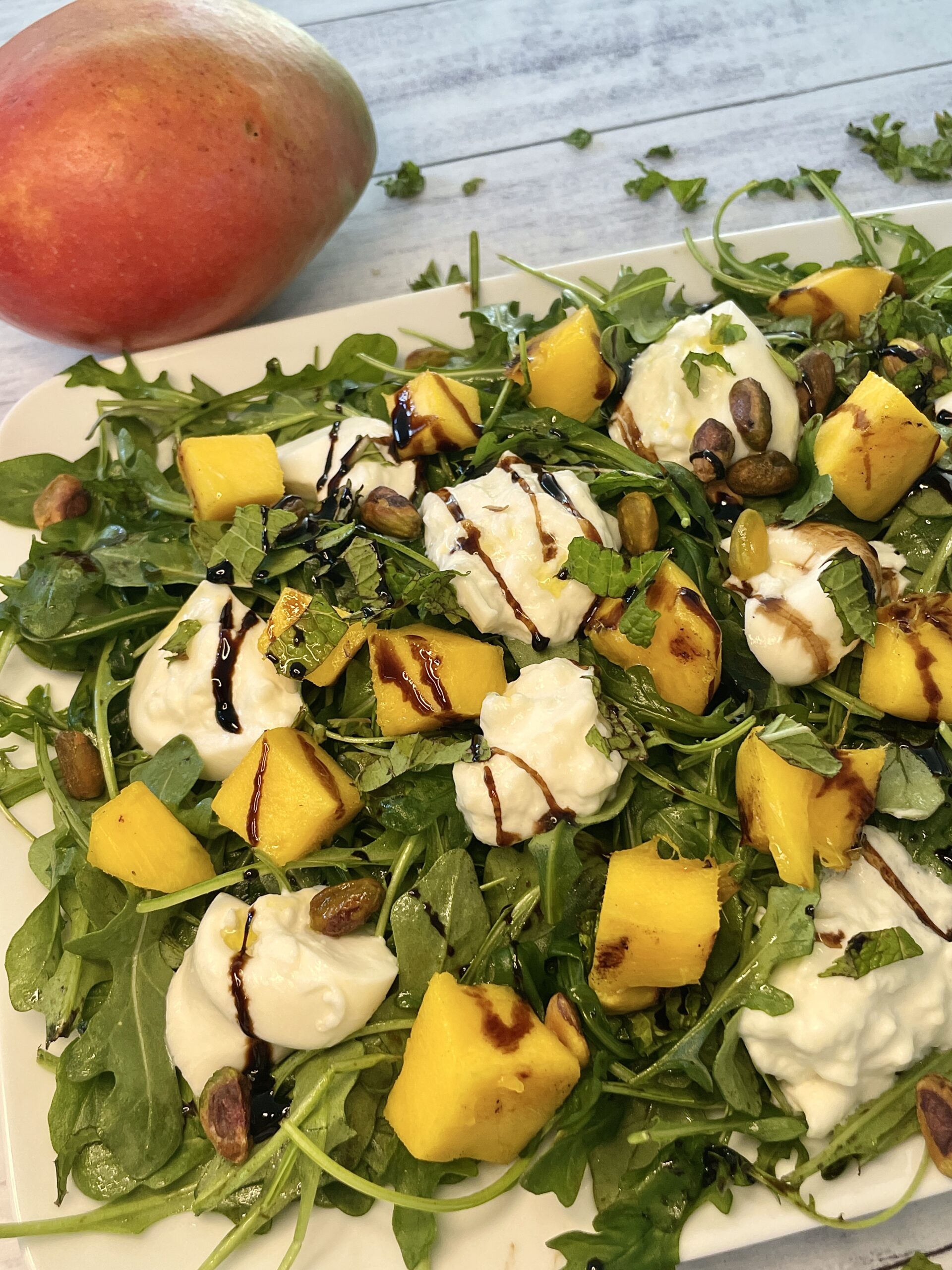Grilled Mango and Burrata Salad with Pistachios
